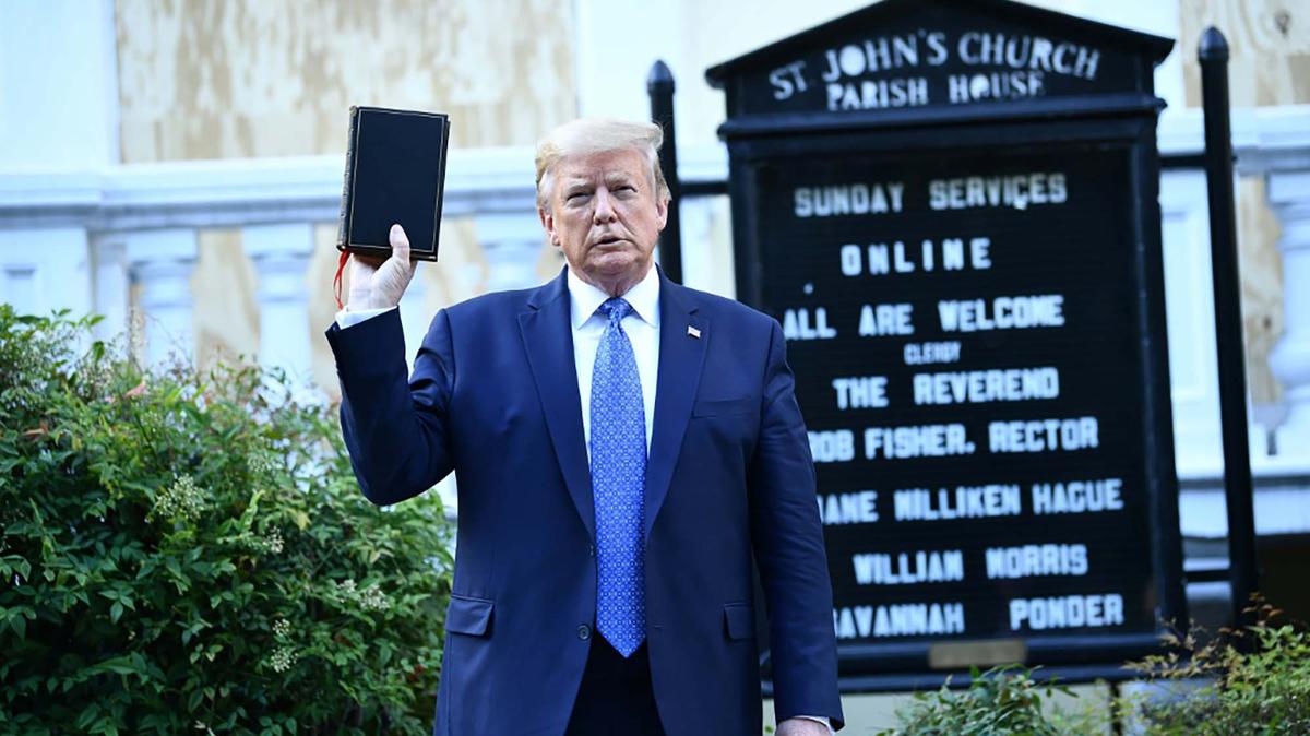 President Donald Trump holds up a Bible in front of St John's Church after walking across Lafayette Park from the White House in Washington, D.C., on June 1, 2020, during Black Lives Matter protests against the killing of George Floyd a week earlier.