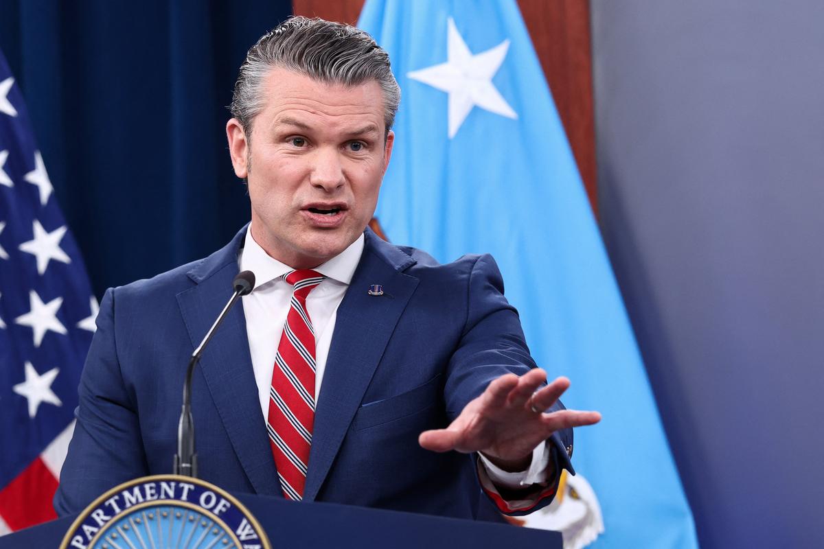 U.S. Secretary of Defense Pete Hegseth holds a briefing on the Iran war, with Chairman of the Joint Chiefs of Staff General Dan Caine (not pictured), at the Pentagon in Washington, D.C., U.S., May 5, 2026. REUTERS/Kevin Lamarque