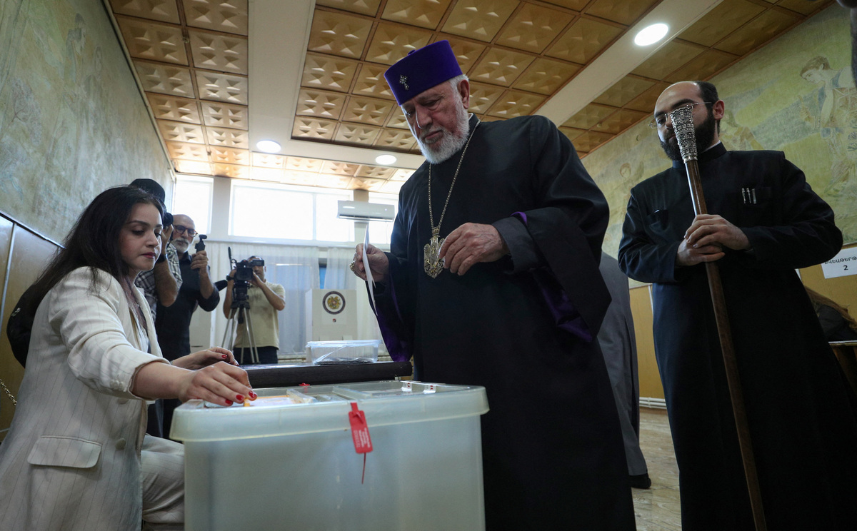 Catholicos Karekin II, head of the Armenian Apostolic Church, waits before casting a ballot at a polling station during a parliamentary election in Vagharshapat (Etchmiadzin community), Armenia, June 7, 2026. Vahram Baghdasaryan/Photolure via REUTERS