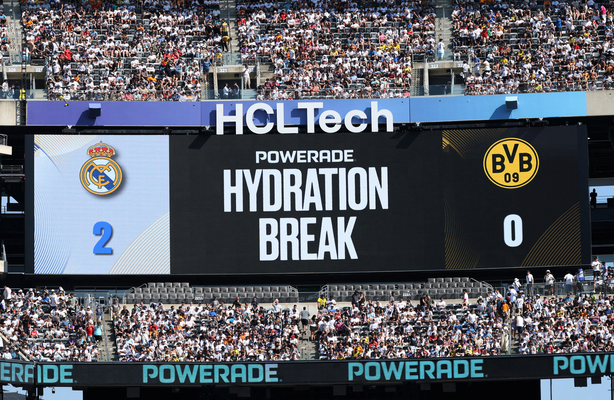 FILE PHOTO: Soccer Football - FIFA Club World Cup - Quarter Final - Real Madrid v Borussia Dortmund - MetLife Stadium, East Rutherford, New Jersey, U.S. - July 5, 2025 A big screen displays a first half hydration break message REUTERS/Mike Segar/File Photo