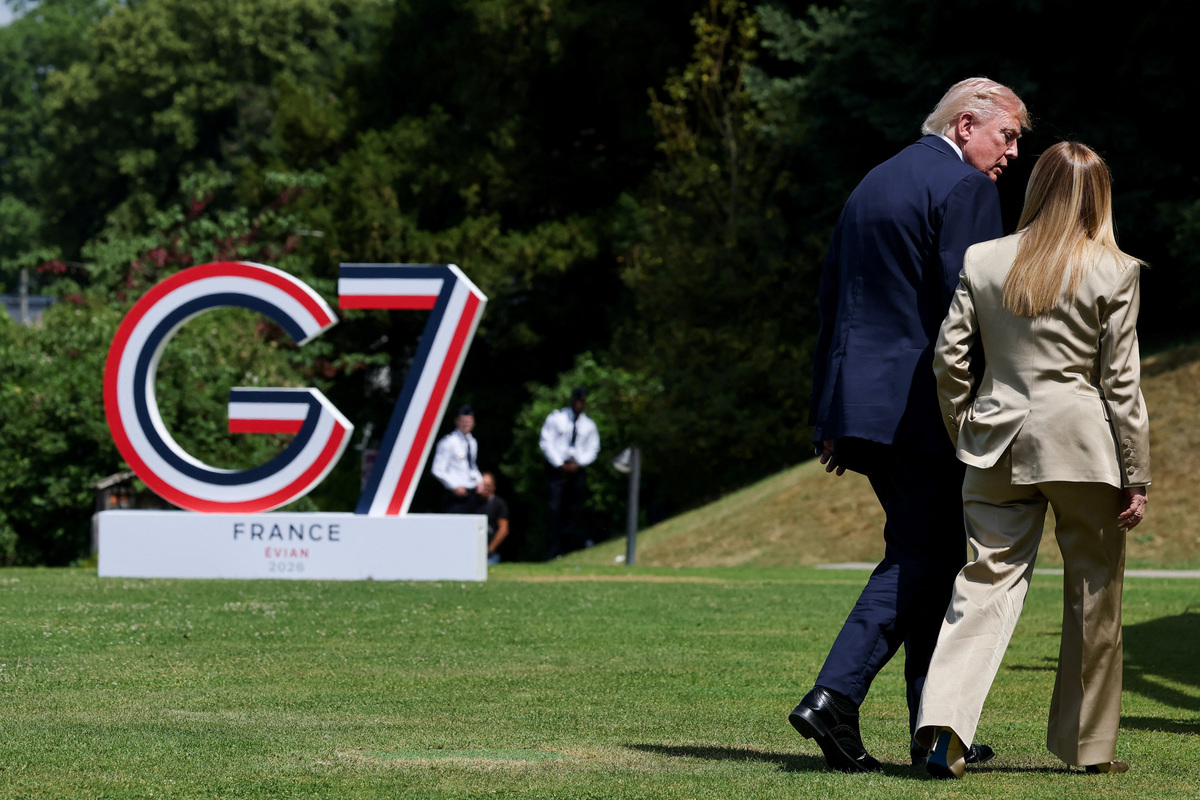 U.S. President Donald Trump walks with Italian Prime Minister Giorgia Meloni during the G7 summit, in Evian-les-Bains, France, June 16, 2026. REUTERS/Christian Hartmann