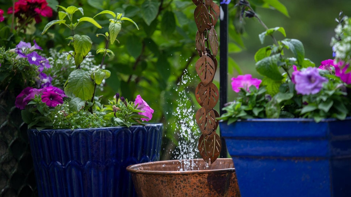 DIYer Makes Stunning Garden Water Feature Out of Planters 