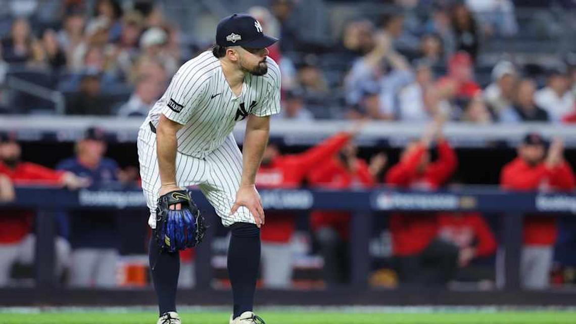  New York Yankees starting pitcher Carlos Rodon (55) reacts after an error during the third inning against the Boston Red Sox during game two of the Wildcard round for the 2025 MLB playoffs at Yankee Stadium | Brad Penner-Imagn Images 