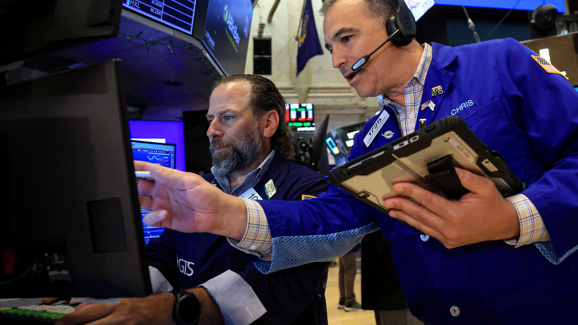 Wall Street ends choppy session lower as tech shares drop 