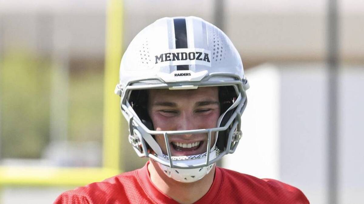  Jun 3, 2026; Henderson, NV, USA; Las Vegas Raiders quarterback Fernando Mendoza (15) warms up during organized team activities at Intermountain Health Performance Center. Mandatory Credit: Candice Ward-Imagn Images | Candice Ward-Imagn Images 