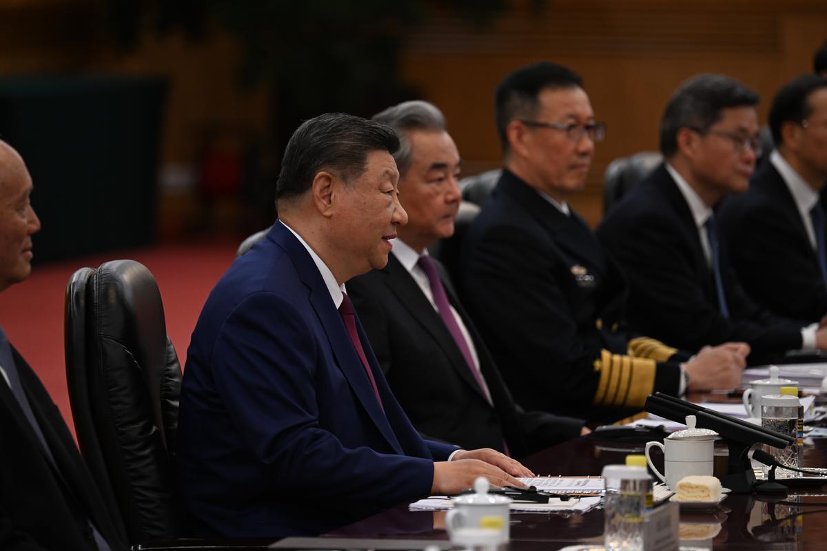 President Xi Jinping of China takes part in bilateral talks with President Donald Trump and an American delegation at the Great Hall of the People in Beijing on Thursday, May 14, 2026. During the first U.S. presidential visit to China in nearly a decade, Xi delivered a warning on Taiwan, saying that the issue, if handled poorly, could lead to conflict and "an extremely dangerous situation." (Kenny Holston/The New York Times)..