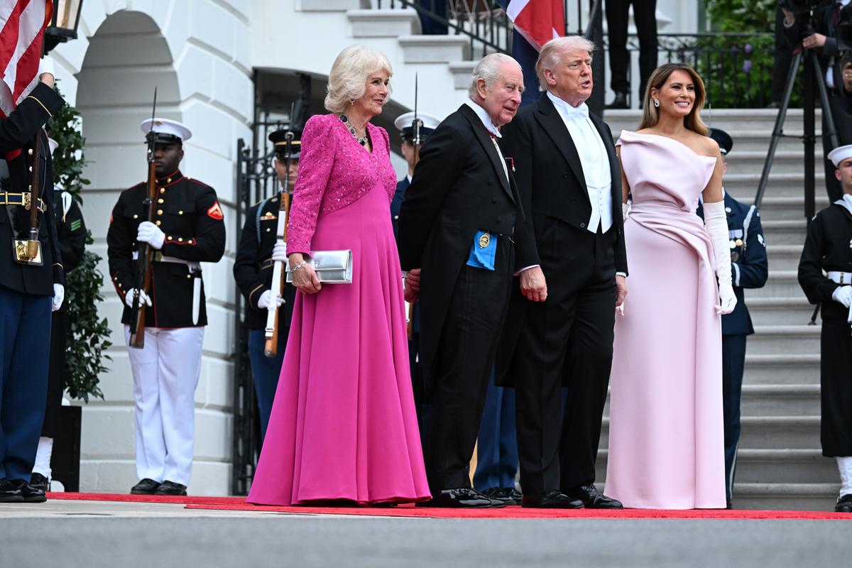 President Donald Trump and first lady Melania Trump, right, greet King Charles III and Queen Camilla of the United Kingdom as they arrive for a state dinner at the White House in Washington, on Tuesday, April 28, 2026. (Kenny Holston/The New York Times)