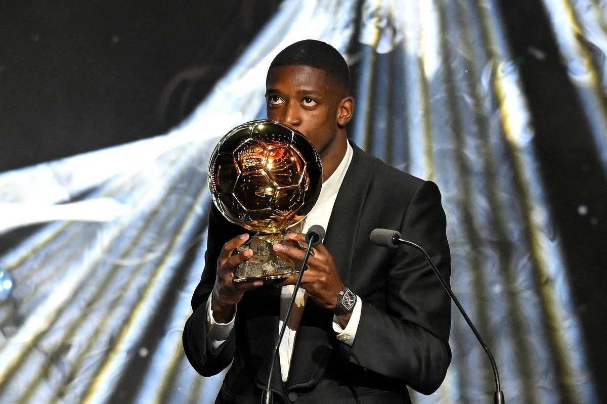  Ousmane Dembele kisses the Ballon d'Or trophy during the 69th Ballon D'Or Ceremony at Theatre Du Chatelet on September 22, 2025. Photo by Kristy Sparow - UEFA/UEFA via Getty Images