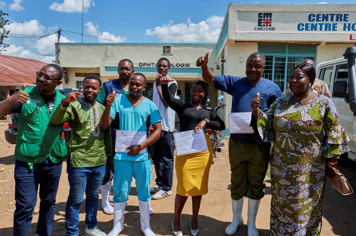 Congolese health workers who recovered from the Ebola virus pose for a photograph at the Evangelical Medical Center (CEM), as agencies intensify efforts to contain a new Ebola outbreak caused by the Bundibugyo virus strain, in Bunia, Ituri province, Democratic Republic of Congo, May 31, 2026. REUTERS/Gradel Muyisa Mumbere