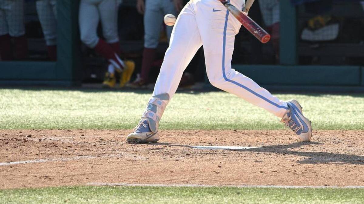  Jun 5, 2026; Chapel Hill, NC, USA; North Carolina Tar Heels outfielder Owen Hull (8) hits the ball in the seventh inning agains the USC Trojans at Boshamer Stadium. Mandatory Credit: Zachary Taft-Imagn Images | Zachary Taft-Imagn Images 