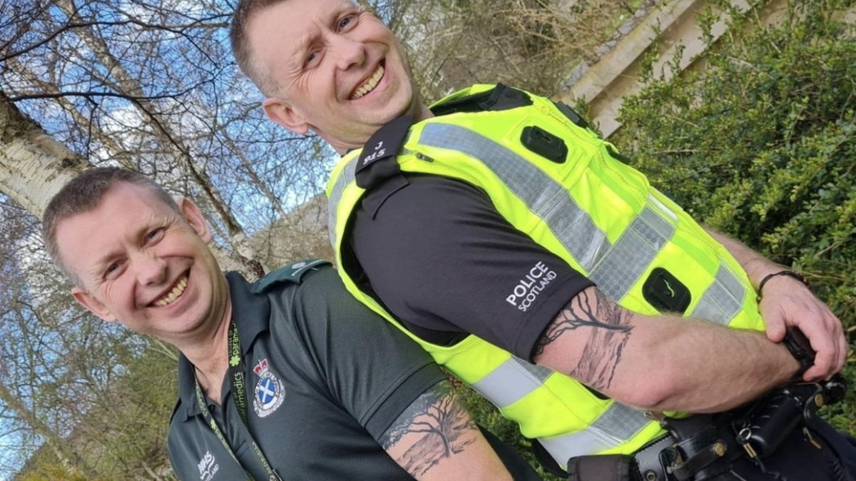 Lee and Liam Myers have 20 years of service as ambulance technicians. (Scottish Ambulance Service via SWNS). 