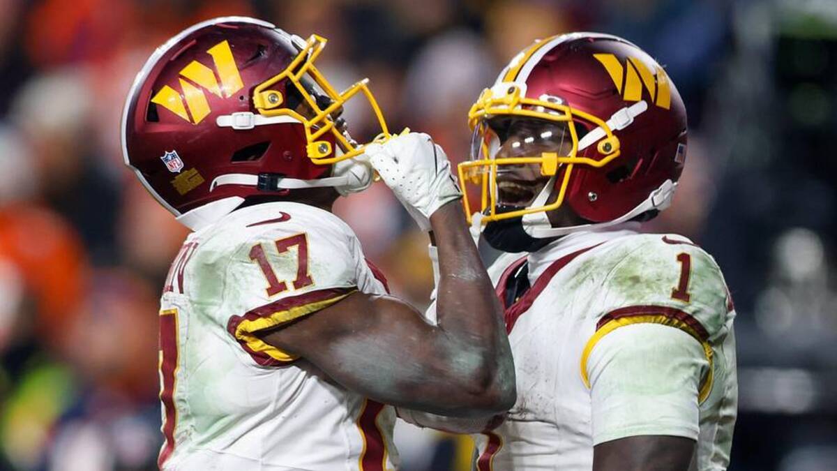  Nov 30, 2025; Landover, Maryland, USA; Washington Commanders wide receiver Terry McLaurin (17) celebrates after scoring a touchdown with Washington Commanders wide receiver Deebo Samuel (1) in overtime of the game at Northwest Stadium. | Peter Casey-Imagn Images 