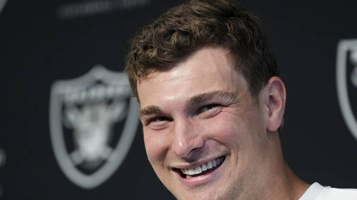  May 2, 2026; Henderson, NV, USA; Las Vegas Raiders quarterback Fernando Mendoza (15) speaks during a news conference at the team's Rookie Minicamp at Intermountain Health Performance Center. Mandatory Credit: Candice Ward-Imagn Images | Candice Ward-Imagn Images 