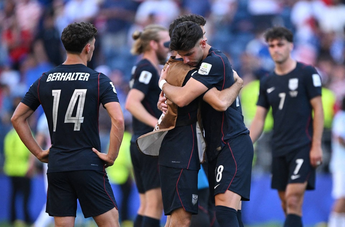  July 6, 2026; Seattle, Washington, U.S.; Christian Pulisic and Max Arfsten of the U.S. look dejected as they embrace after the match following their elimination from the World Cup. Mandatory Credit: Troy Wayrynen-Imagn Images 