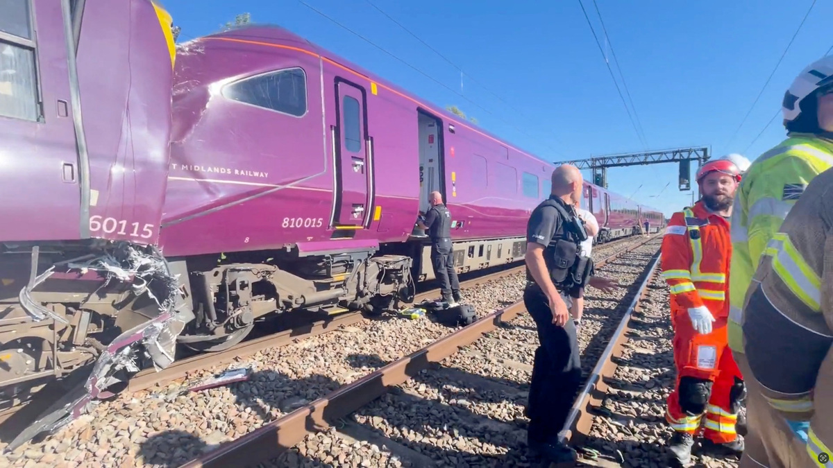 Emergency service workers gather at the scene of a collision involving two trains near Bedford, Britain, June 19, 2026, in this screengrab obtained from a video. Dr Pete Knapp/via REUTERS