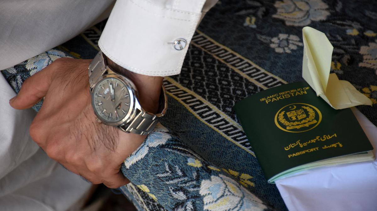 A Pakistani Shi'ite Muslim man, who was working as a building security officer in the United Arab Emirates, speaks with Reuters at his village, after being deported along with many others following the U.S.-Israeli war against Iran, in Chakwal, Pakistan May 5, 2026. REUTERS/Waseem Khan
