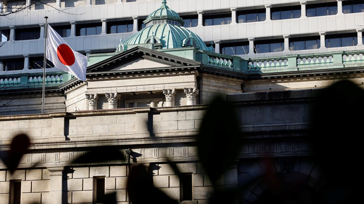 A Japanese flag flutters atop the Bank of Japan headquarters in Tokyo, Japan  December19, 2025. REUTERS/Manami Yamada