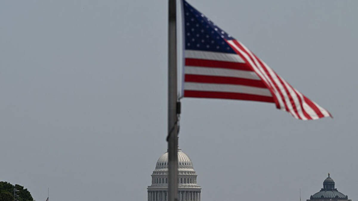 House narrowly passes stopgap spending bill, but shutdown fight looms