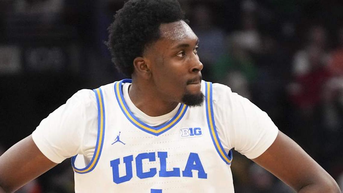 Mar 14, 2026; Chicago, IL, USA; UCLA Bruins center Xavier Booker (1) reacts after making a three point basket against the Purdue Boilermakers during the first half at United Center. Mandatory Credit: David Banks-Imagn Images | David Banks-Imagn Images 