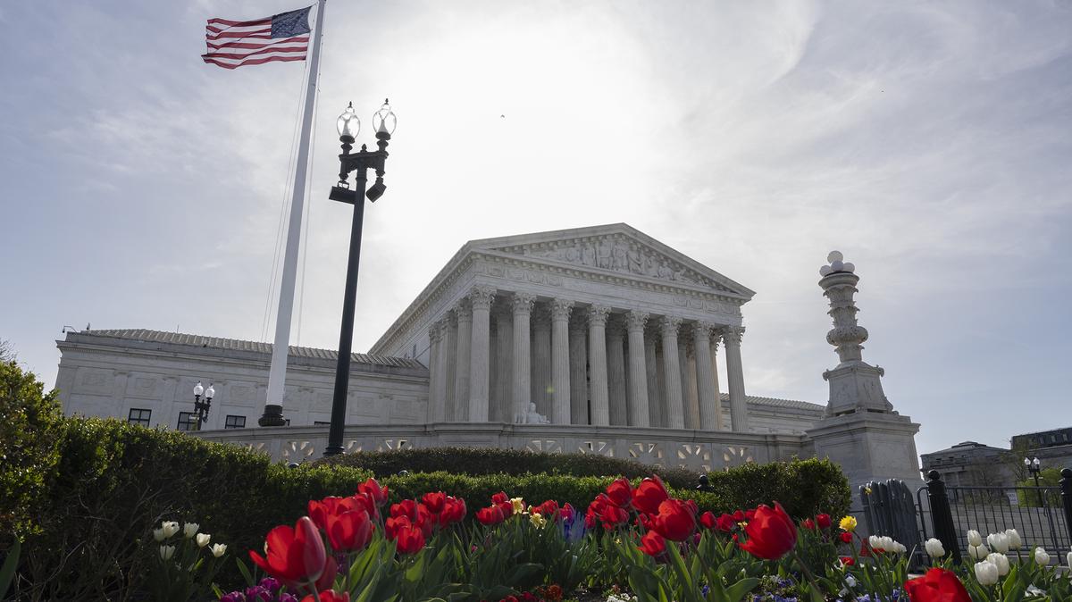 Flowers adorn a garden in front of the U.S. Supreme Court building on March 31, 2026, in Washington, D.C. (Roberto Schmidt/Getty Images/TNS)