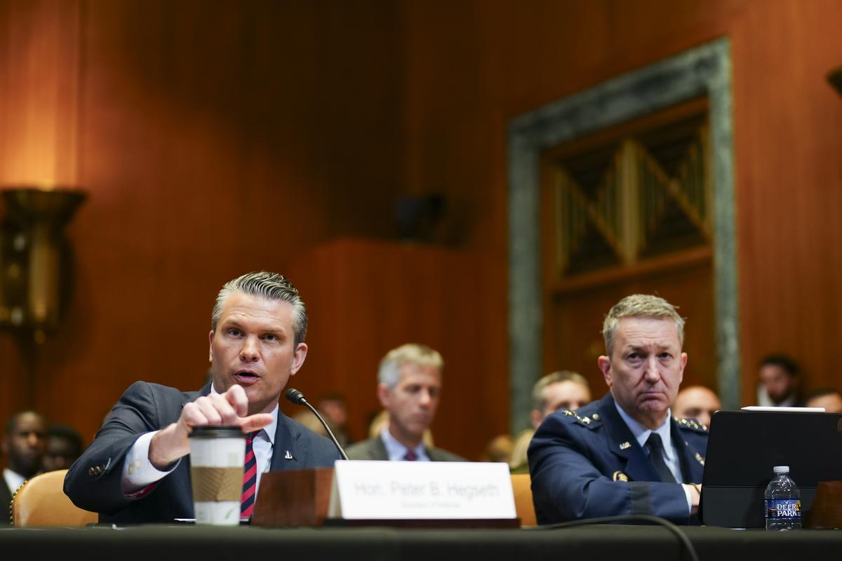 Defense Secretary Pete Hegseth, left, and Gen. Dan Caine, the chairman of the Joint Chiefs of Staff, testify during a Senate Appropriations Subcommittee on Defense hearing on the Department of Defense's budget request on Capitol Hill in Washington, on Tuesday, May 12, 2026. (Tierney L. Cross/The New York Times)