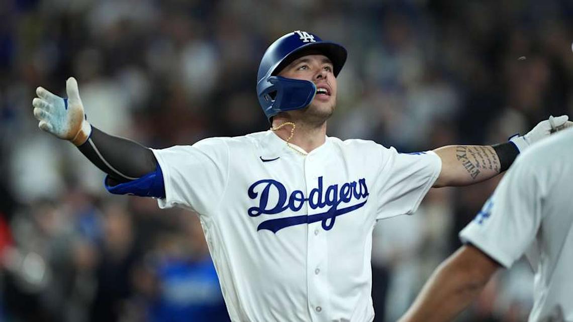  Los Angeles Dodgers designated hitter Dalton Rushing is showered with sunflower seeds after hitting a grand slam home run in the eighth inning against the New York Mets at Dodger Stadium. | Kirby Lee-Imagn Images 