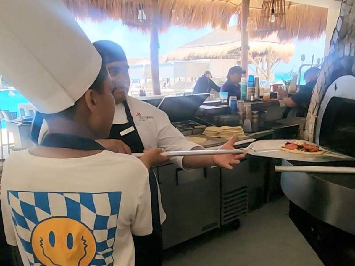  The poolside pizza making class is a pizza-loving tween's dream, giving them the opportunity to make their own masterpiece from scratch! Photo credit: Kimberly Miles 
