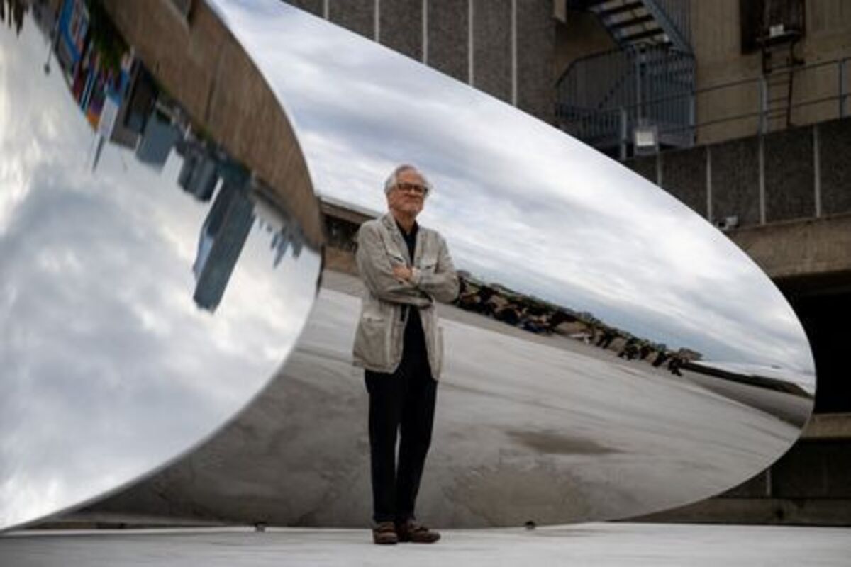 British-Indian sculptor Anish Kapoor poses for a photograph next to his installation 'Tsunami' (2025) during the press view for 'Anish Kapoor' at the Hayward Gallery, in London, Britain, June 15, 2026. REUTERS/Chris J. Ratcliffe
