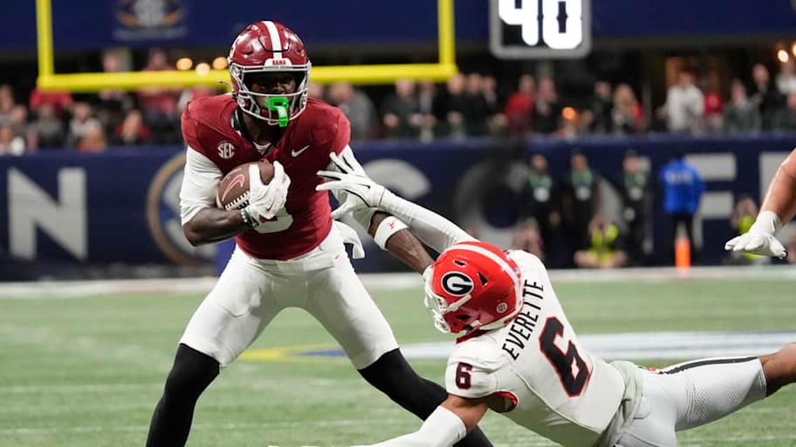  Dec 6, 2025; Atlanta, GA, USA; Alabama wide receiver Germie Bernard (5) evades a tackle by Georgia defensive back Daylen Everette (6) at Mercedes-Benz Stadium. Mandatory Credit: Gary Cosby Jr.-Tuscaloosa News | Gary Cosby Jr. / USA TODAY NETWORK via Imagn Images 