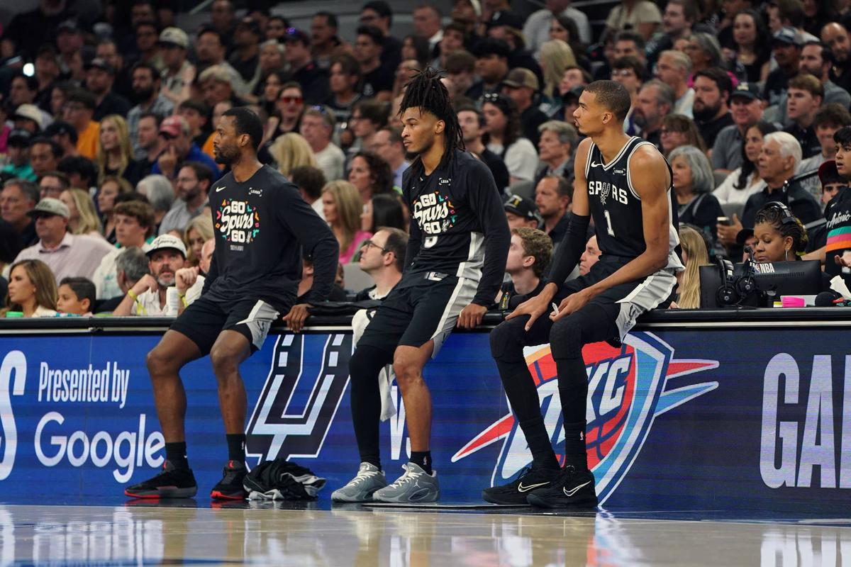 May 28, 2026; San Antonio, Texas, USA; San Antonio Spurs forward Victor Wembanyama (1), guard Stephon Castle (5) and forward Harrison Barnes (40) wait for substitution calls during game six of the western conference finals for the 2026 NBA playoffs against Oklahoma City Thunder at Frost Bank Center. Mandatory Credit: Dustin Safranek-Imagn Images 