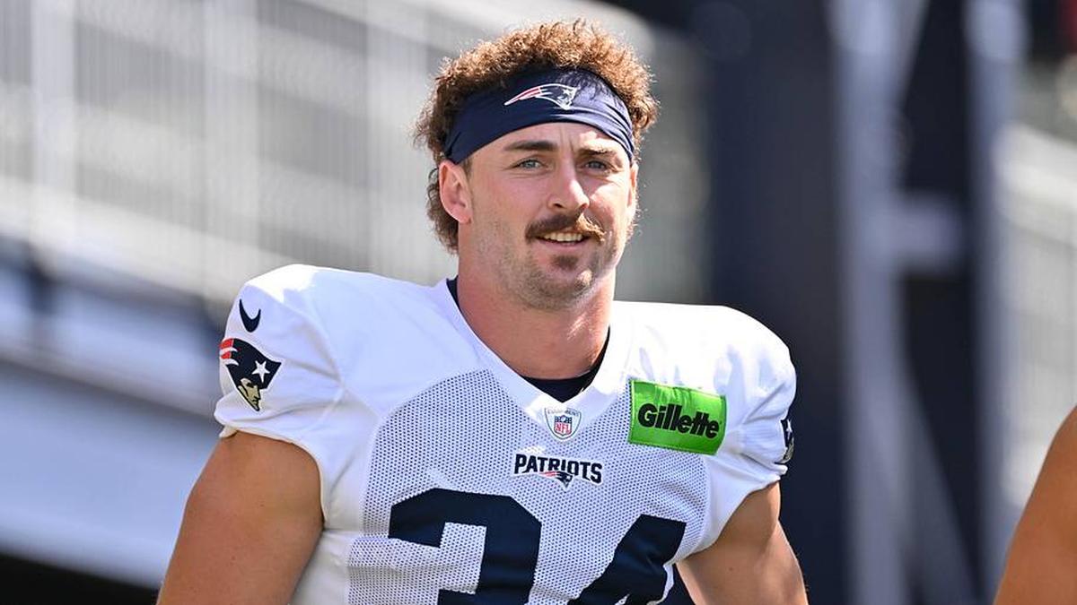  Jul 28, 2025; Foxborough, MA, USA; New England Patriots running back Lan Larison (34) heads to the practice fields for training camp at Gillette Stadium. Mandatory Credit: Eric Canha-Imagn Images | Eric Canha-Imagn Images 