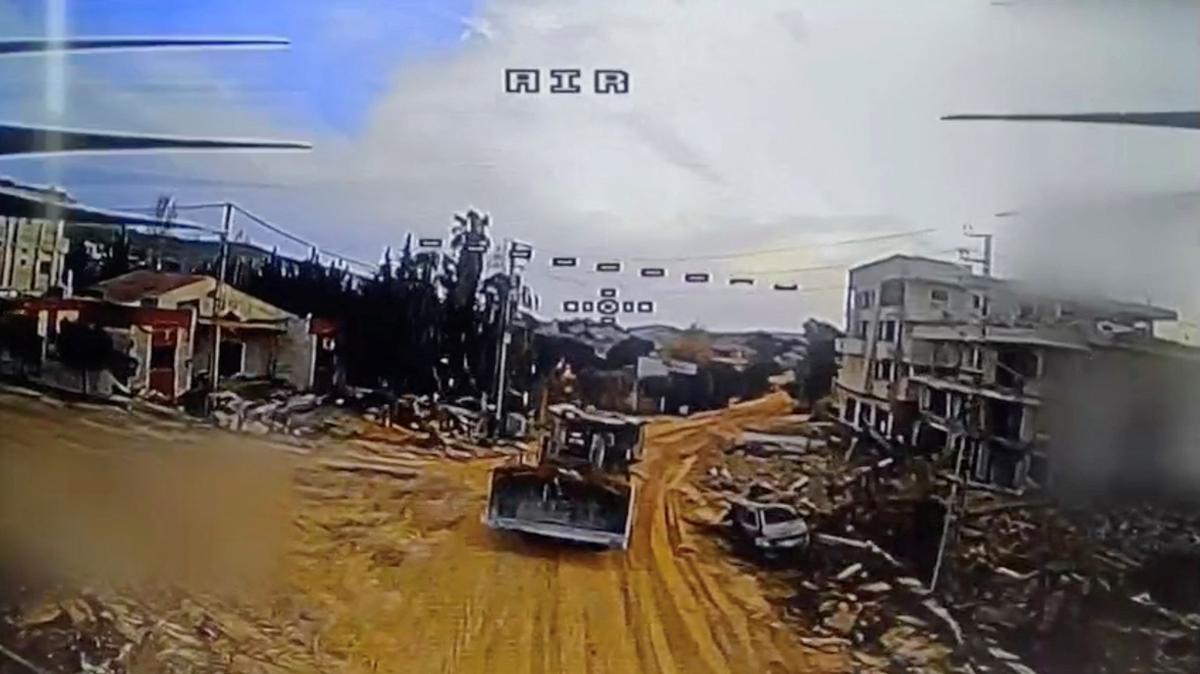 A screengrab taken from a video released by Hezbollah says to show an Israeli D9 armoured buldozer moments before being hit by an FPV drone attack, in Bint Jbeil, Lebanon, with the date of the video given as April 15, 2026.   HEZBOLLAH MILITARY MEDIA/Handout via REUTE