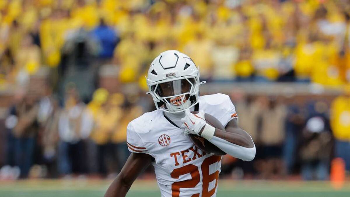  Sep 7, 2024; Ann Arbor, Michigan, USA; Texas Longhorns running back Quintrevion Wisner (26) rushes in the first half against the Michigan Wolverines at Michigan Stadium. Mandatory Credit: Rick Osentoski-Imagn Images | USA TODAY Sports via Reuters Connect 