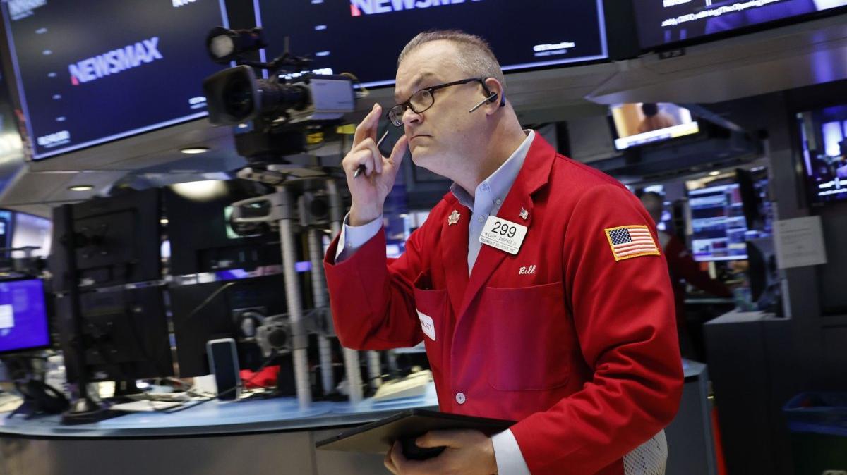 Traders work on the floor of the New York Stock Exchange on Wall Street on Thursday in New York City. The Dow Jones Industrial Average opened down more than 1,000 points and kept falling, down 1,679 points at the close. Photo by John Angelillo/UPI