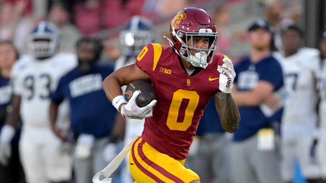  Sep 6, 2025; Los Angeles, California, USA; USC Trojans wide receiver Zacharyus Williams (0) runs just short of the end zone during the second half against the Georgia Southern Eagles at United Airlines Field at the Los Angeles Memorial Coliseum. Mandatory Credit: Jayne Kamin-Oncea-Imagn Images | Jayne Kamin-Oncea-Imagn Images 