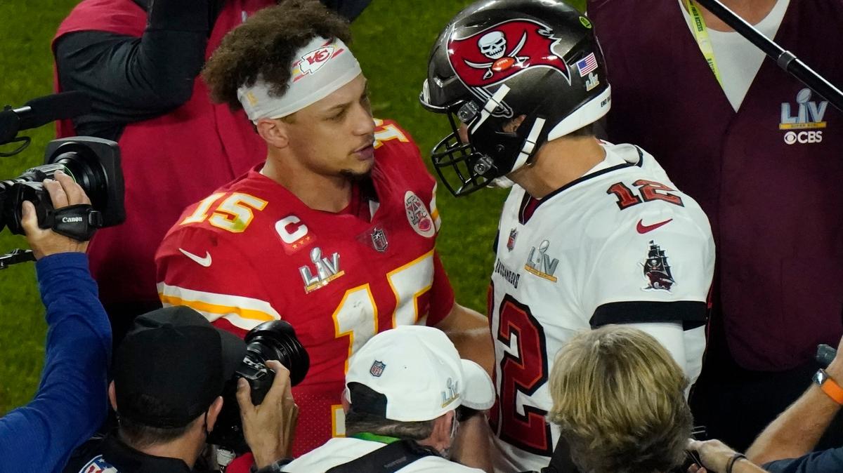 Kansas City Chiefs quarterback Patrick Mahomes (15) and Tampa Bay Buccaneers quarterback Tom Brady (12) greet following the NFL Super Bowl 55 football game Sunday, Feb. 7, 2021, in Tampa, Florida. Tampa Bay won 31-9.