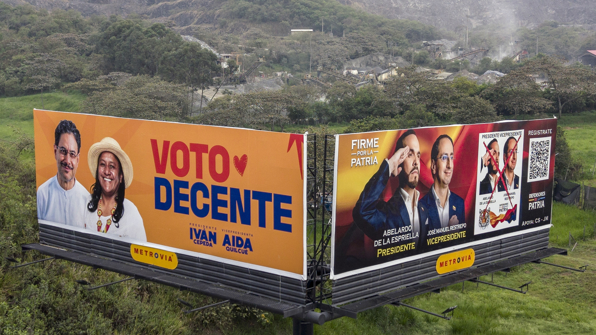 Aerial view of billboards inviting to vote for presidential canditate Abelardo de la Espriella, of the Salvadores de la Patria movement (right), and for Ivan Cepdepa, of the Pacto Historico Political Party, in the upcoming presidential election in Cali, Colombia, on June 17, 2026. Colombians vote on June 21, 2026, in a presidential runoff pitting a hard-right opera-singer-turned-lawyer against a leftist senator, an election with stark consequences for the country's stumbling peace process with armed groups and strained ties with Washington. (Joaquin Sarmiento/AFP via Getty Images/TNS)