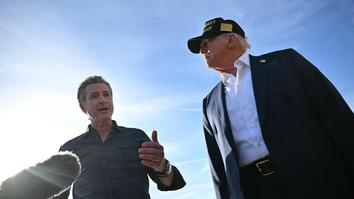 President Donald Trump, right, and California Gov. Gavin Newsom speak to the media last January about the Los Angeles wildfires. Today they are fighting over Trump’s call for new congressional maps to win more Republican seats.