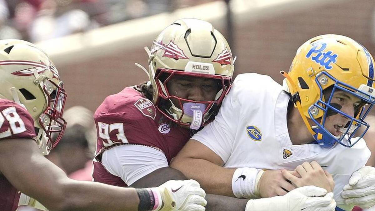  Oct 11, 2025; Tallahassee, Florida, USA; Florida State Seminoles defensive lineman Mandrell Desir (93) sacks Pittsburgh Panthers quarterback Mason Heintschel (6) during the first half at Doak S. Campbell Stadium. Mandatory Credit: Melina Myers-Imagn Images | Melina Myers-Imagn Images 