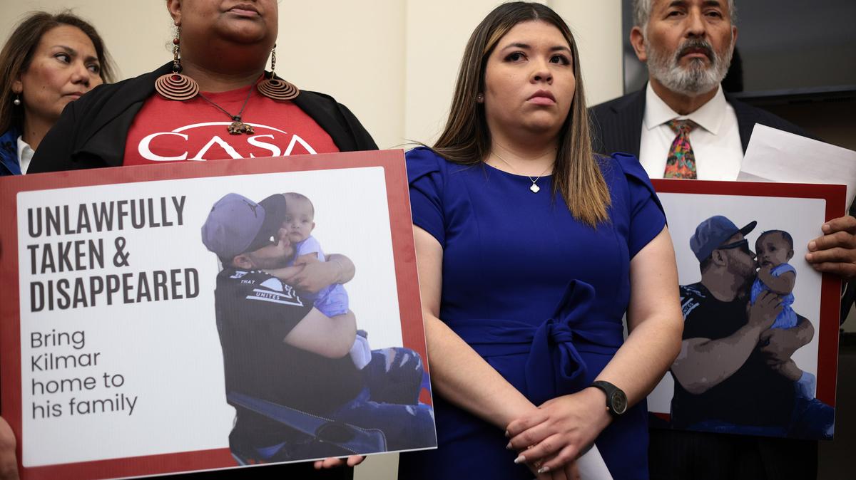The wife of Kilmar Abrego Garcia, Jennifer Vasquez Sura, second from right, listens during a news conference to discuss her husband’s arrest and deportation during a news conference at Cannon House Office Building on April 9, 2025, in Washington, D.C.