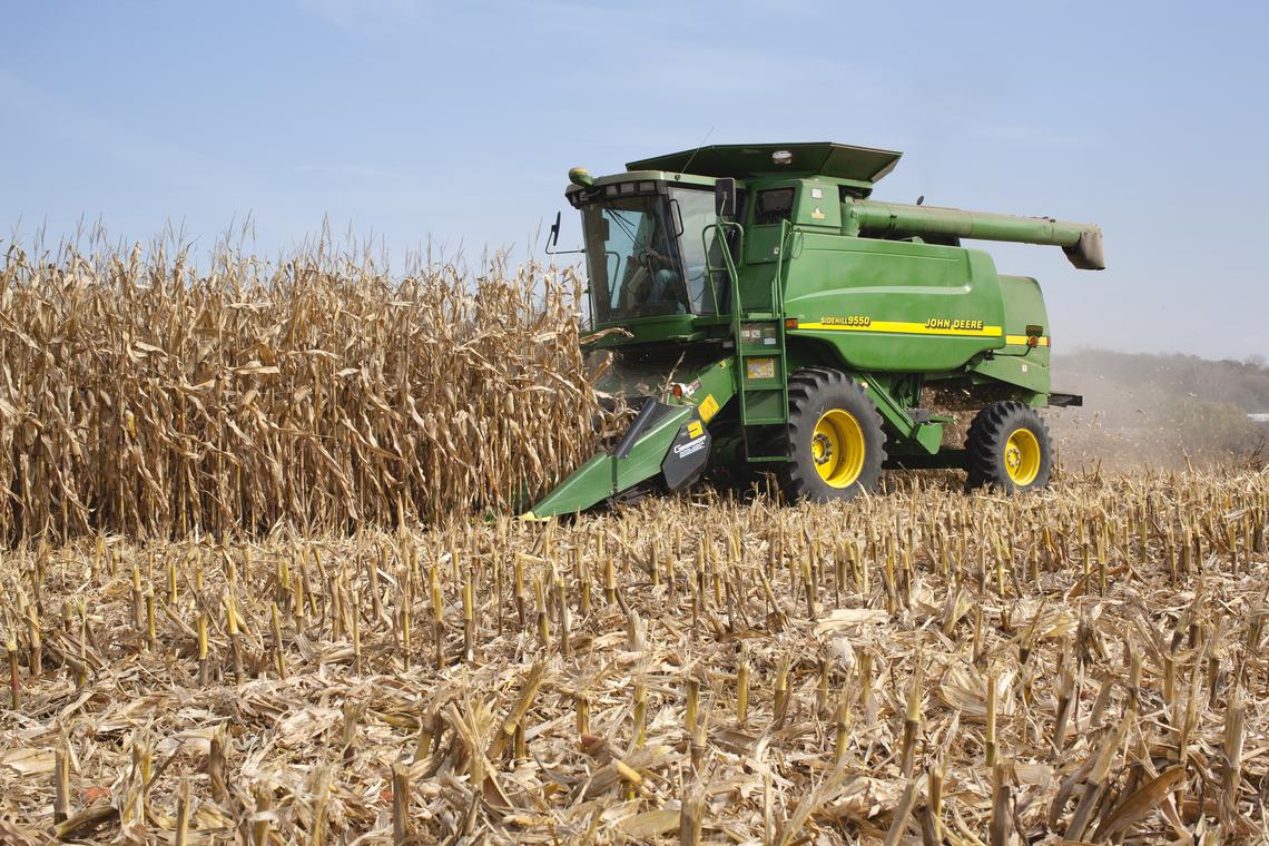  “West Albany, Minnesota, USA – October 12, 2010: A farmer harvests corn in a John Deere combine. John Deere is a major manufacturer of agricultural machinery.” 