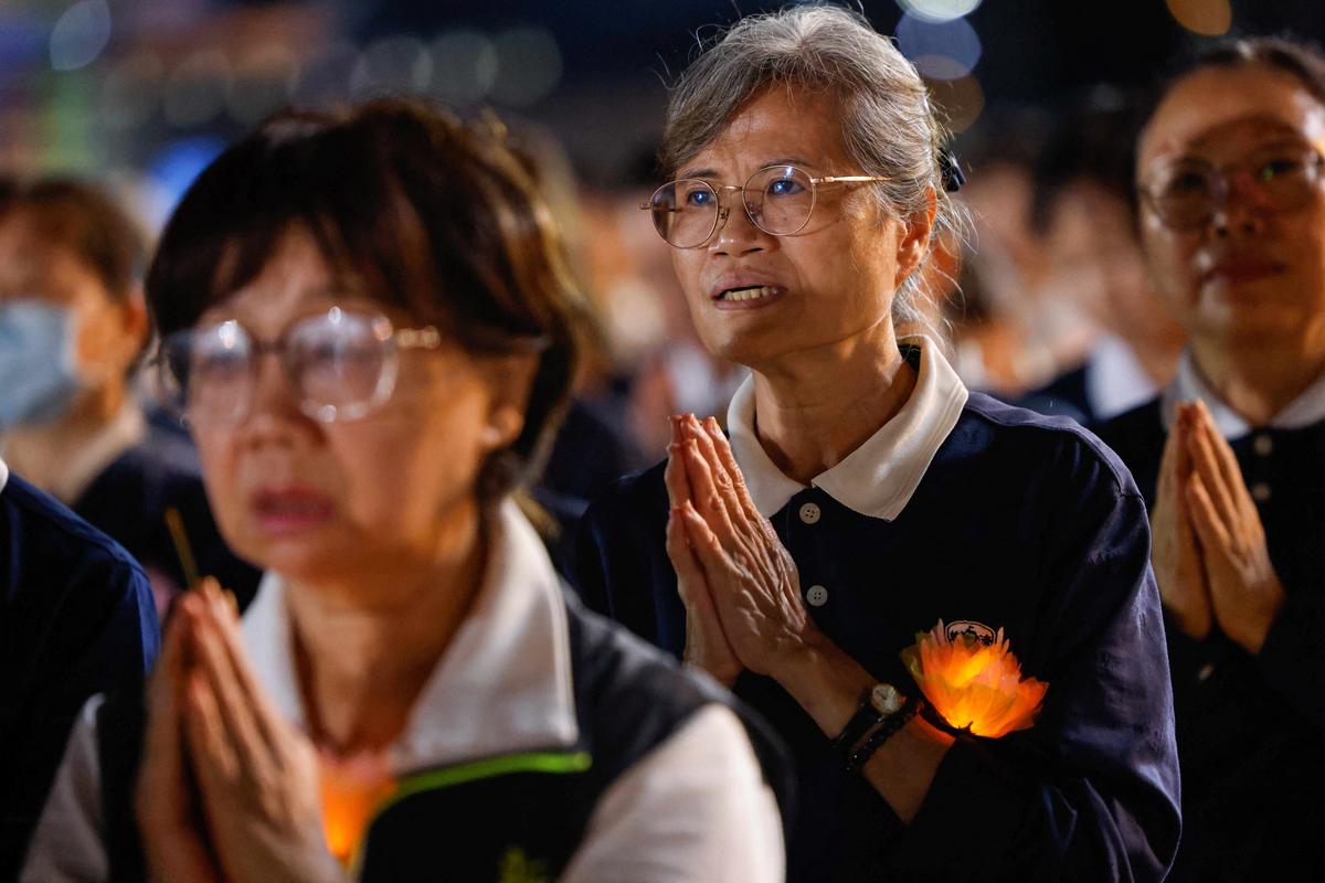 Buddhist Tzu Chi Foundation members commemorate the organization’s 60th anniversary during an annual Buddha bathing ceremony marking Buddha’s birthday, Mother’s Day and Global Tzu Chi Day at Chiang Kai-shek Memorial Hall in Taipei, Taiwan, May 10, 2026. REUTERS/Ann Wang