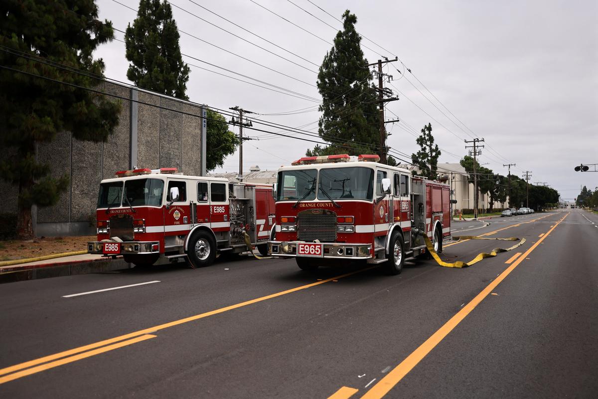 Fire trucks parked during a chemical incident involving a leaking tank of methyl methacrylate, a flammable liquid used in the aerospace industry, forcing an evacuation in the surrounding area, in Garden Grove, California, U.S., May 23, 2026. REUTERS/David Swanson