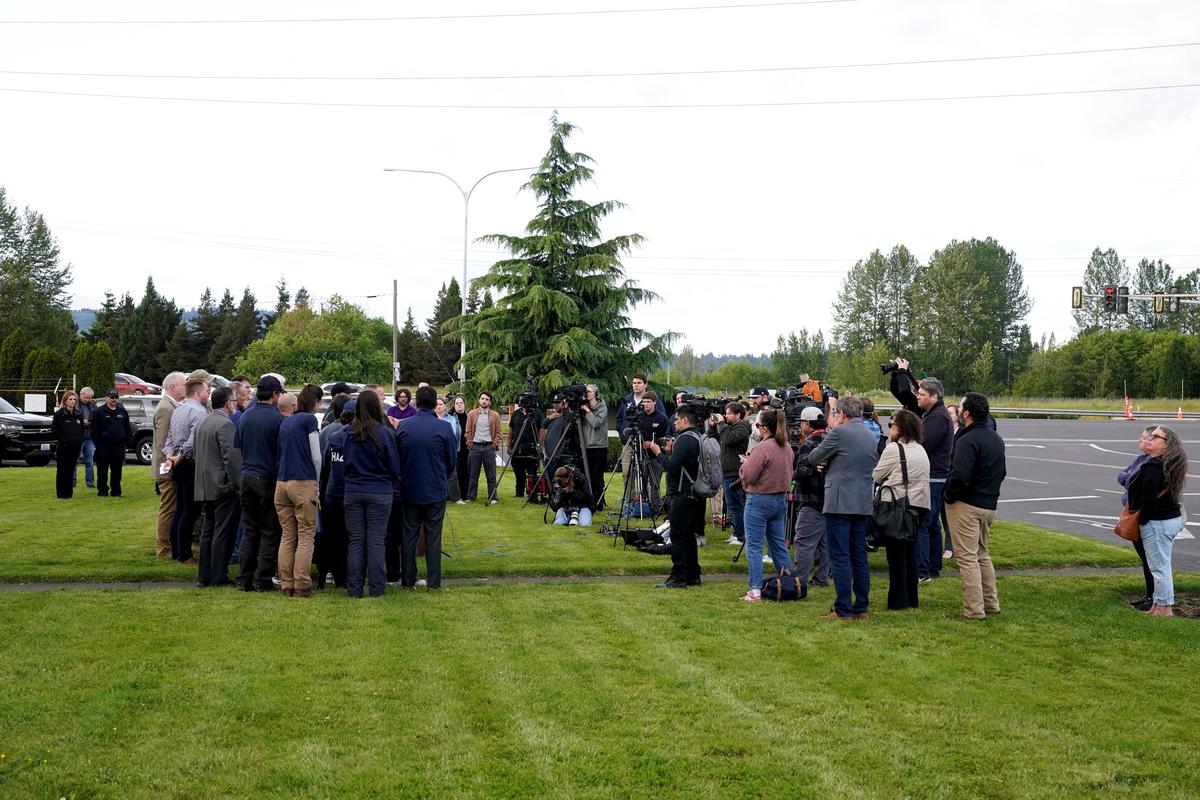 Community members gather for a press conference after a chemical tank rupture at the Nippon Dynawave Packaging pulp and paper mill, in Longview, Washington, U.S., May 26, 2026.  REUTERS/David Ryder