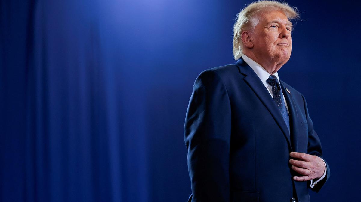 U.S. President Donald Trump stands on the stage on the day of delivering remarks at Rockland Community College in Suffern, New York, U.S., May 22, 2026. REUTERS/Kylie Cooper