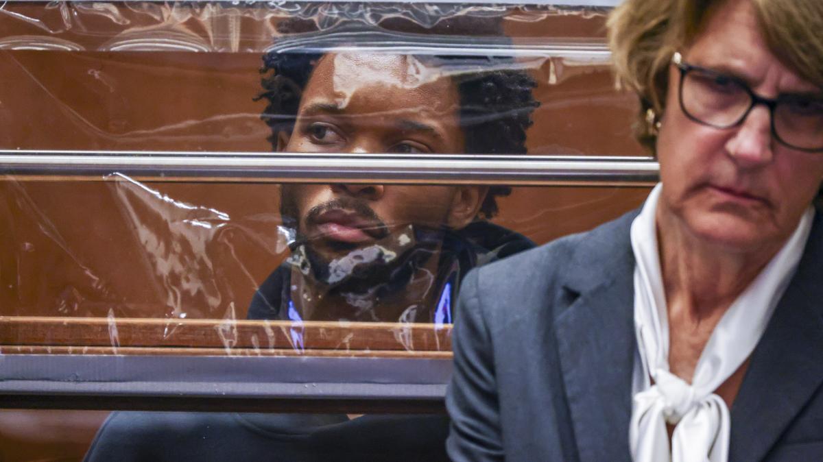 Singer d4vd looks on from behind his defense attorney Marilyn Bednarski, right, during his arraignment for the murder of Celeste Rivas Hernandez at Clara Shortridge Foltz Criminal Justice Center on April 20 in Los Angeles.