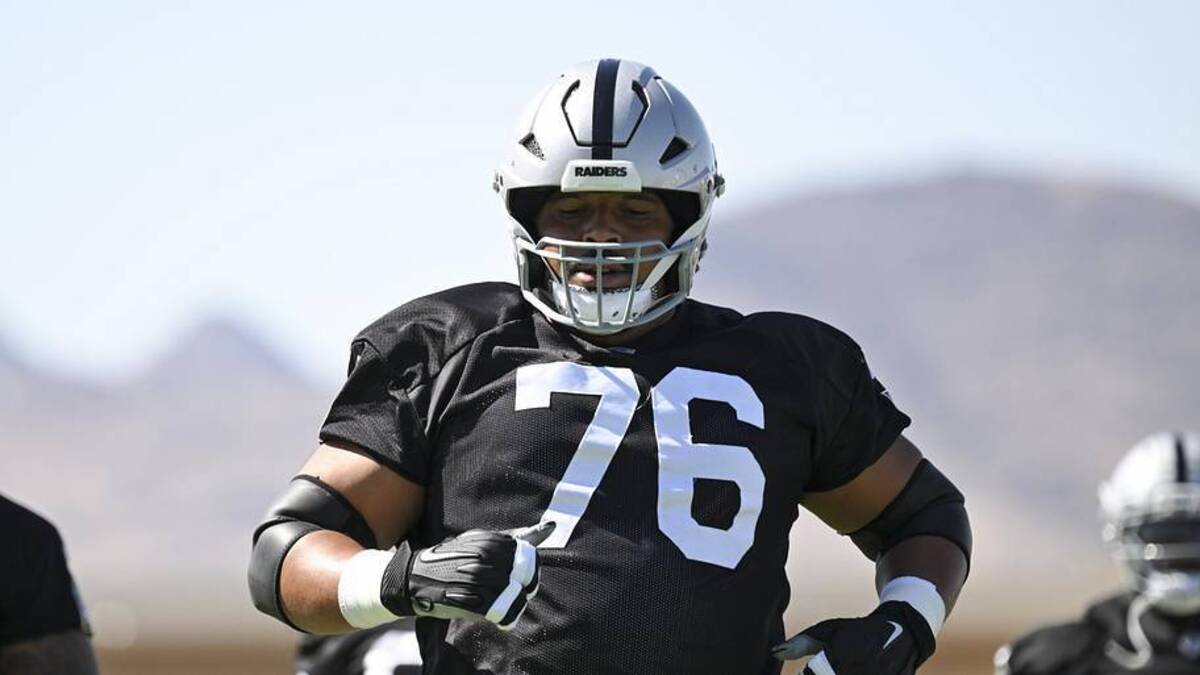  May 20, 2026; Henderson, NV, USA; Las Vegas Raiders guard Caleb Rogers (76) warms up during organized team activities at Intermountain Health Performance Center. Mandatory Credit: Candice Ward-Imagn Images | Candice Ward-Imagn Images 