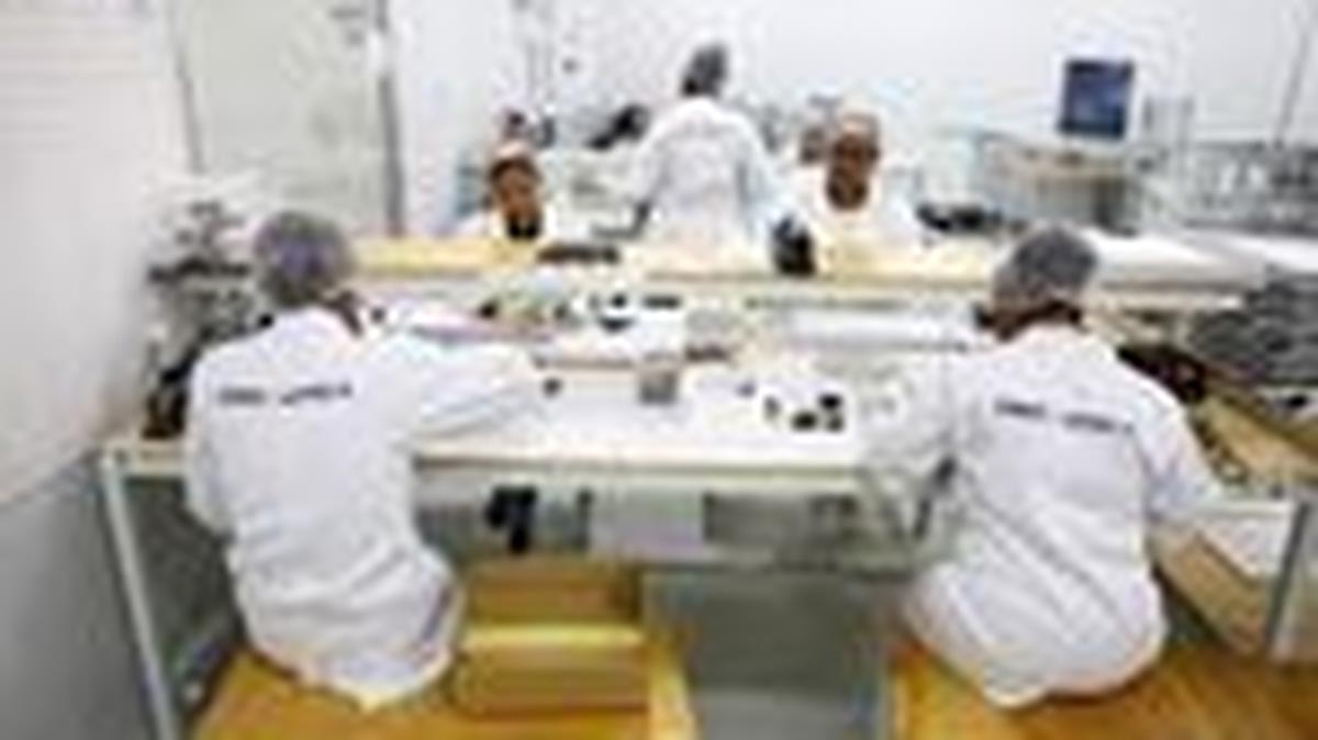 Women work at a factory called Ener-G-Africa, where they produce high-quality solar panels made by an all-women team, in Cape Town, South Africa, February 9, 2023. REUTERS/Esa Alexander