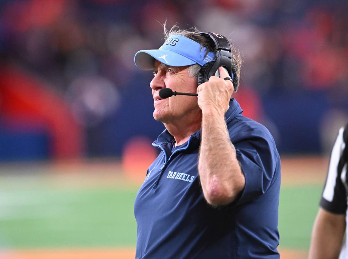  Oct 31, 2025; Syracuse, New York, USA; North Carolina Tar Heels head coach Bill Belichick looks to the clock in the fourth quarter game against the Syracuse Orange at the JMA Wireless Dome. Mandatory Credit: Mark Konezny-Imagn Images 