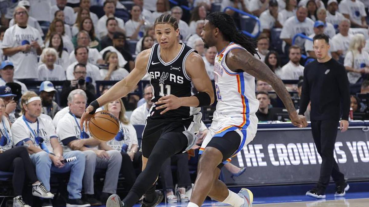  Spurs forward Carter Bryant drives against Thunder guard Cason Wallace during Game 5. | Alonzo Adams-Imagn Images 